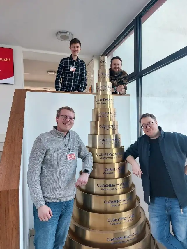 Vier Männer bei MMG
